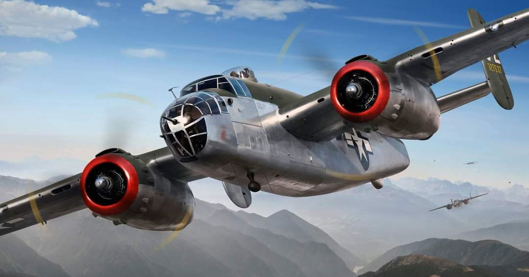 WWII B-25 bomber flying over mountains